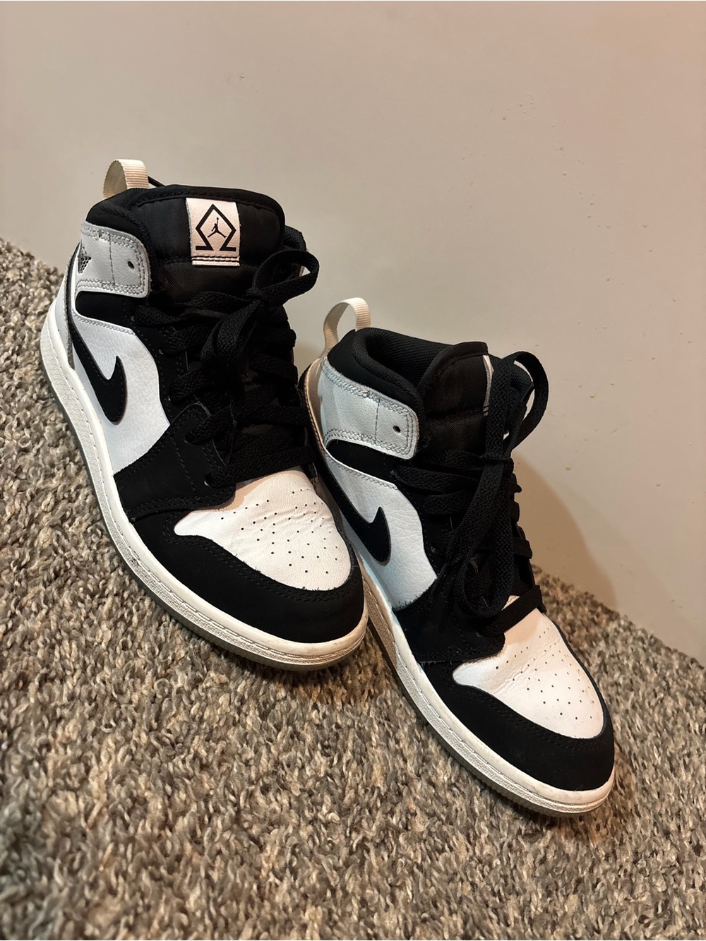 Kidโs Black and White High-Top Basketball Sneakers